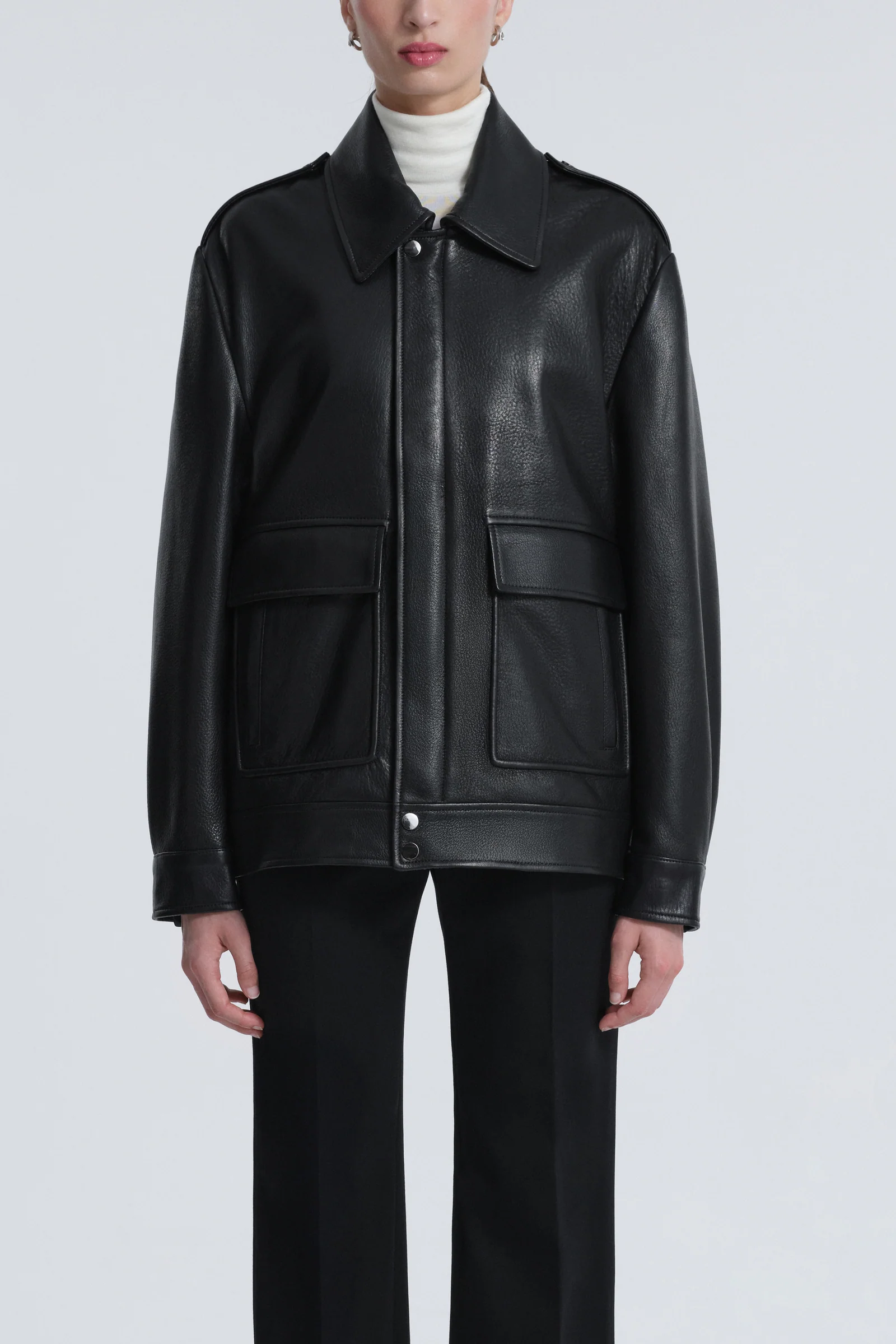 Nour Hammour black leather jacket