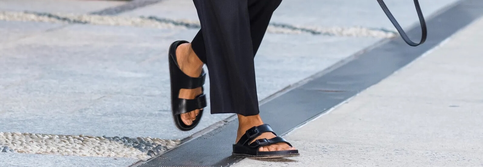 Woman wearing Birkenstock shoes at fashion week
