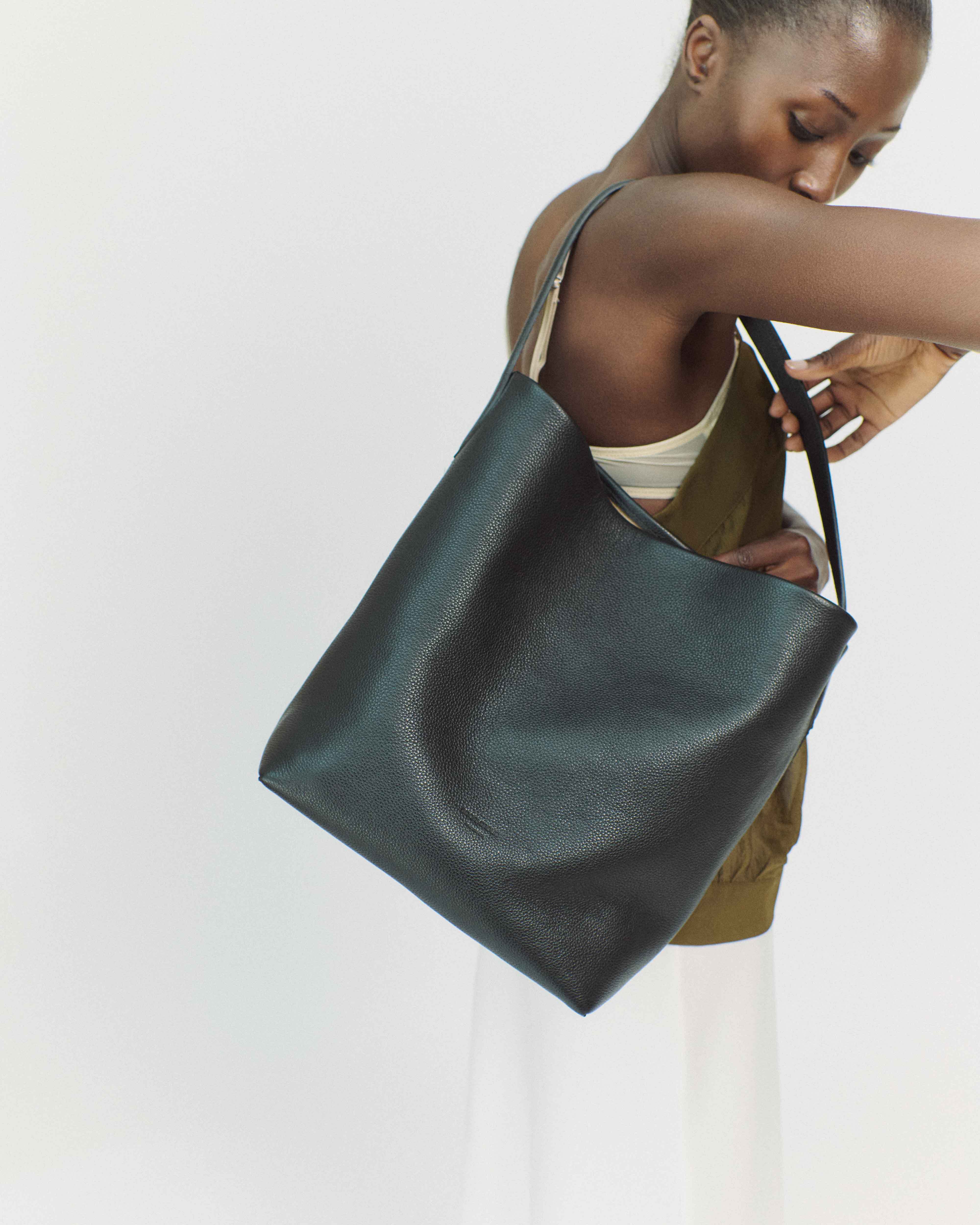 Anonymous versa black slouchy everday tote bag