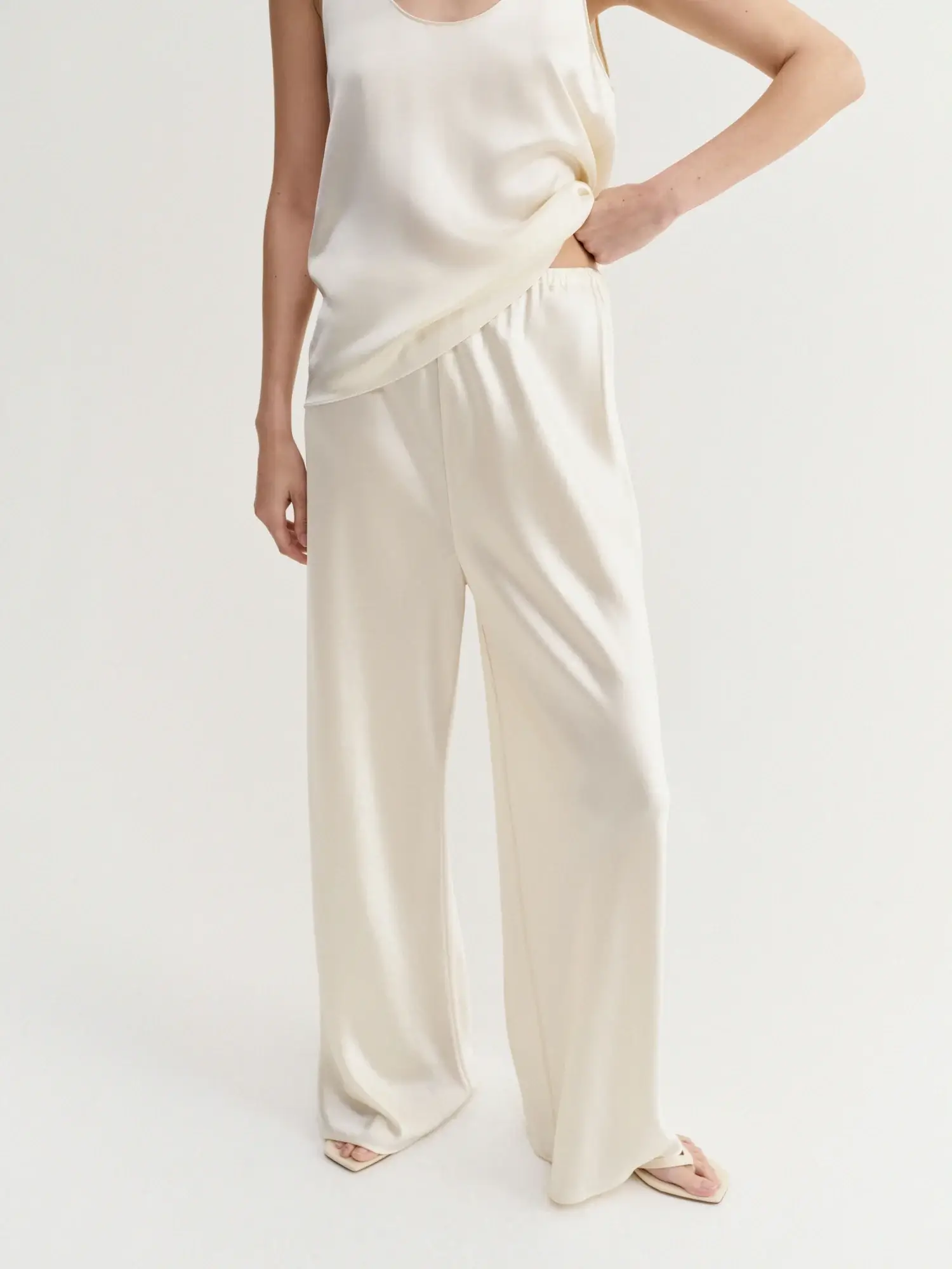 Almada label bias cream satin pants
