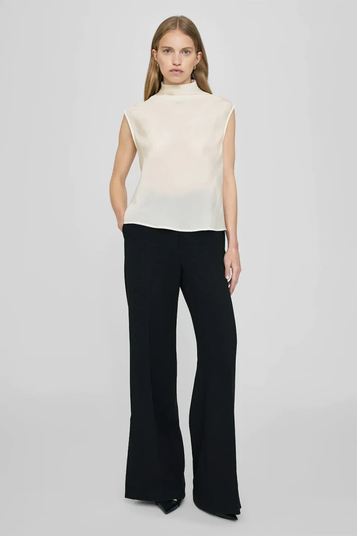 Anine Bing cream silk top with black pants