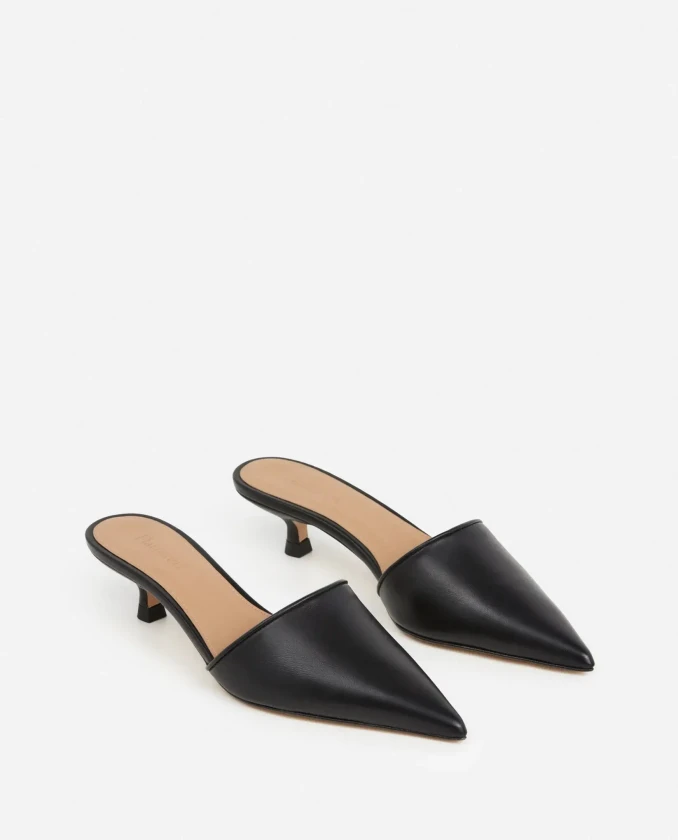 Flattered black mule heels