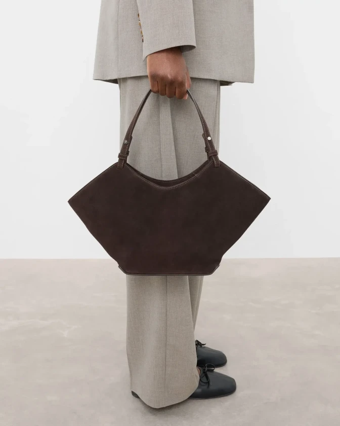 Flattered brown suede bag