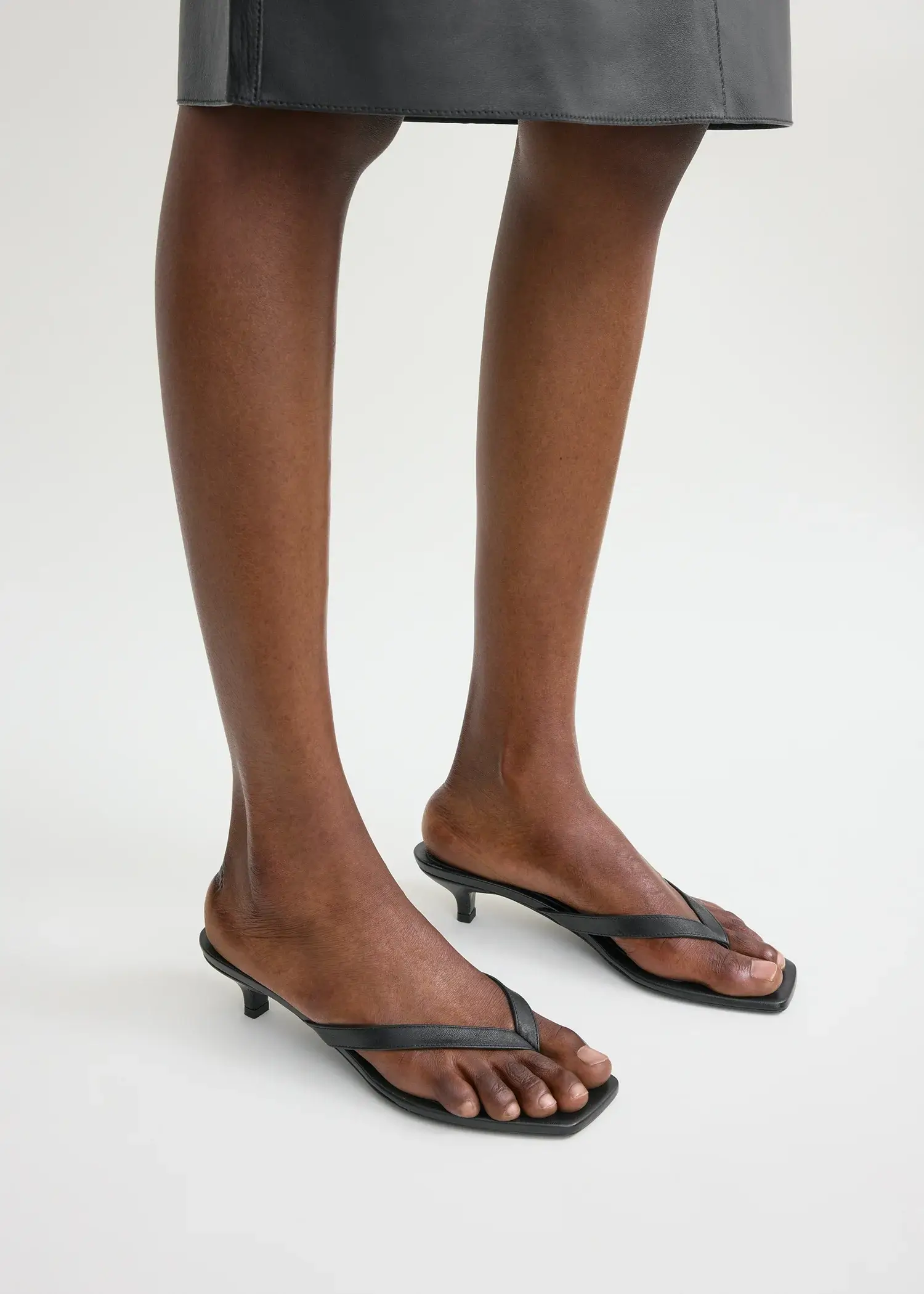 Toteme black flip flop sandals